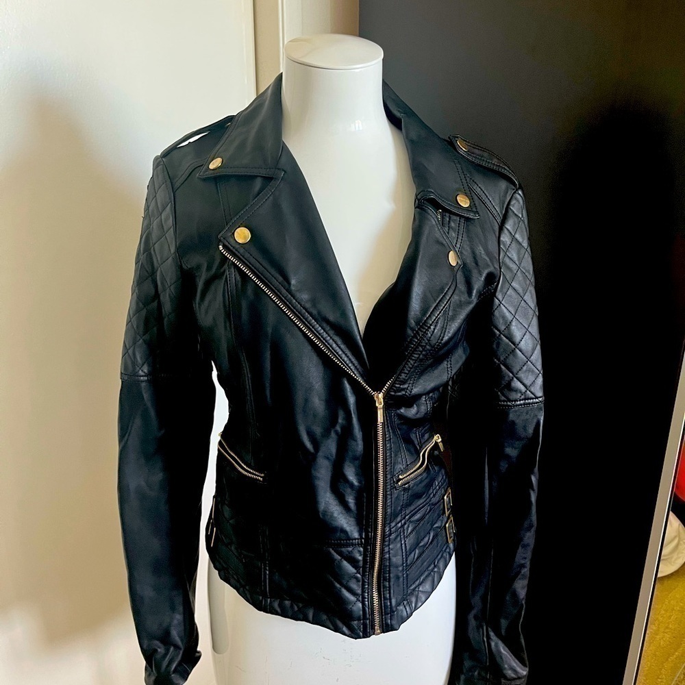 Faux leather jacket size small. Has some blemishes - see images.